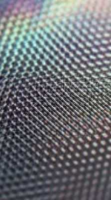 Close-up of Textured Surface with Iridescent Patterns