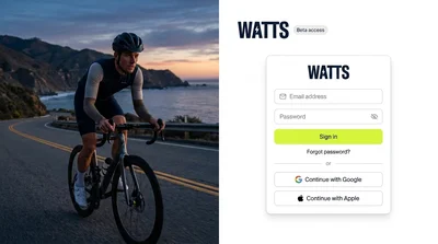 Dynamic Cyclist Riding Along Coastal Road at Sunset