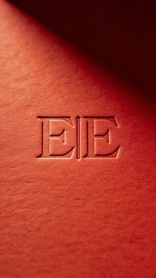 Close-up of Elegant Embossed Logo on Red Leather