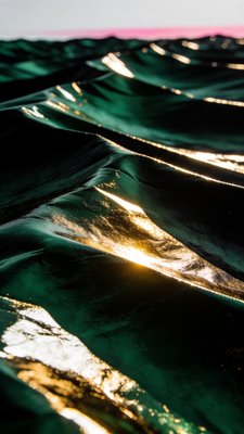 Shimmering Green Waves with Reflections