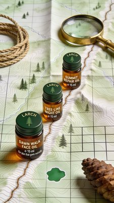 Natural Skincare Oils on a Map Background