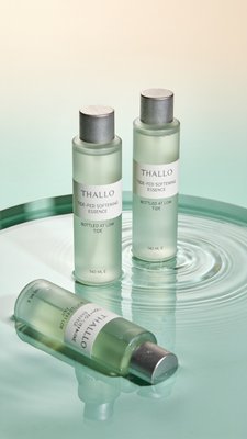 Thallo Tide-Fed Softening Essence Bottles on Water Surface